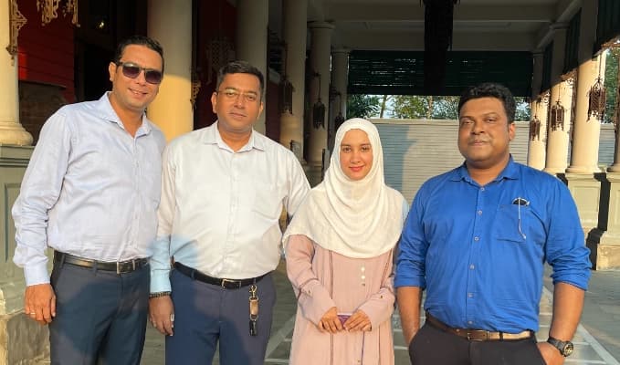 A diverse team of professionals collaborating in an office